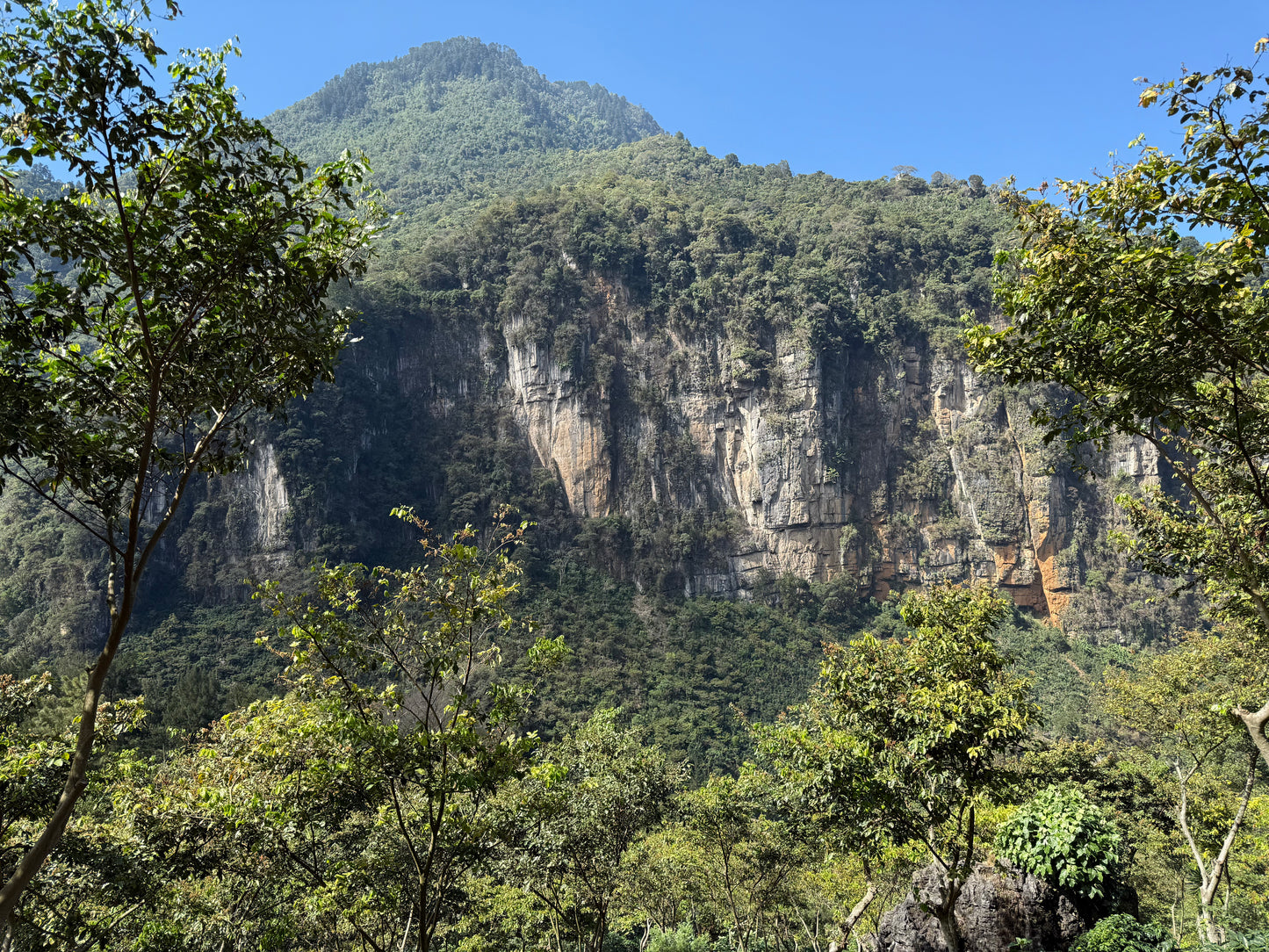 Mountain with greenery in the Huehuetenango region in Guatemala, under a clear blue sky